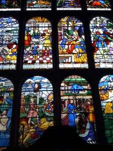 Colorful stained glass windows from the early 17th century, inside the chapel of the Hatfield House.